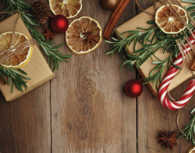Christmas composition in rustic style on a wooden table. Top vie